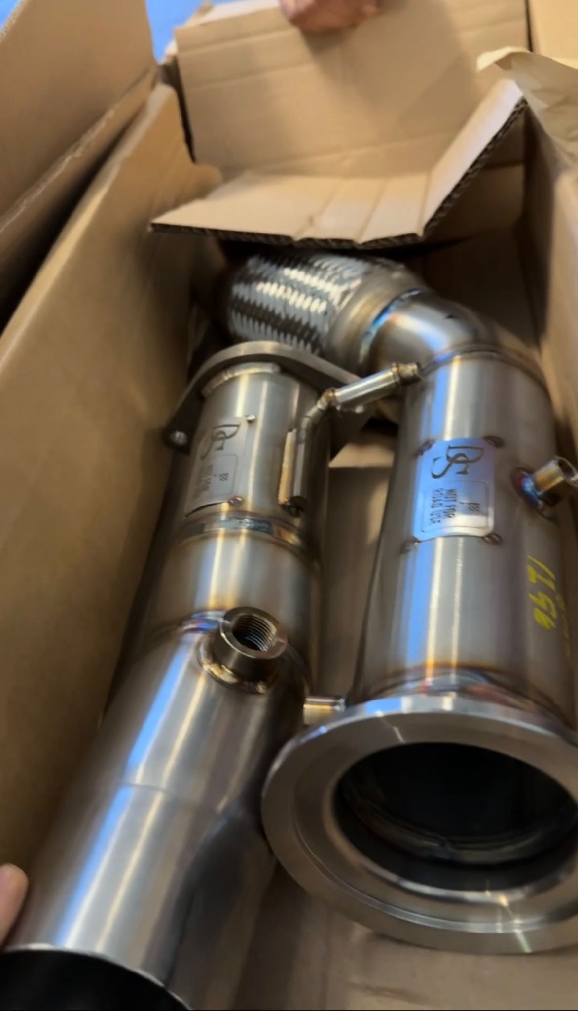 New stainless steel catback exhaust system in its packaging, ready to fit at Ignite Autos